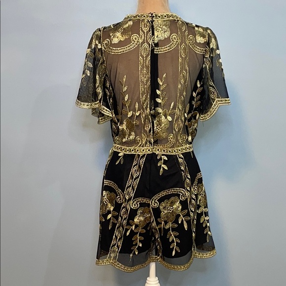 Elegant Black and Gold Romper with Modern Flair Size Medium - Picture 7 of 12